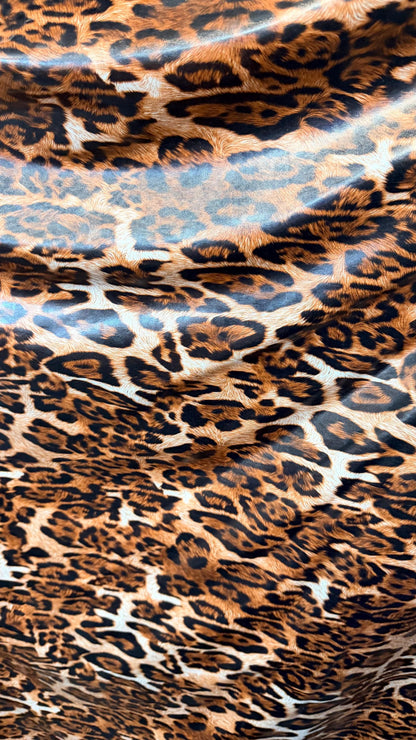 Exotic Leopard design print on latex stretch vinyl 4-way stretch 58/60” Sold by the YD. Ships worldwide from Los Angeles California USA