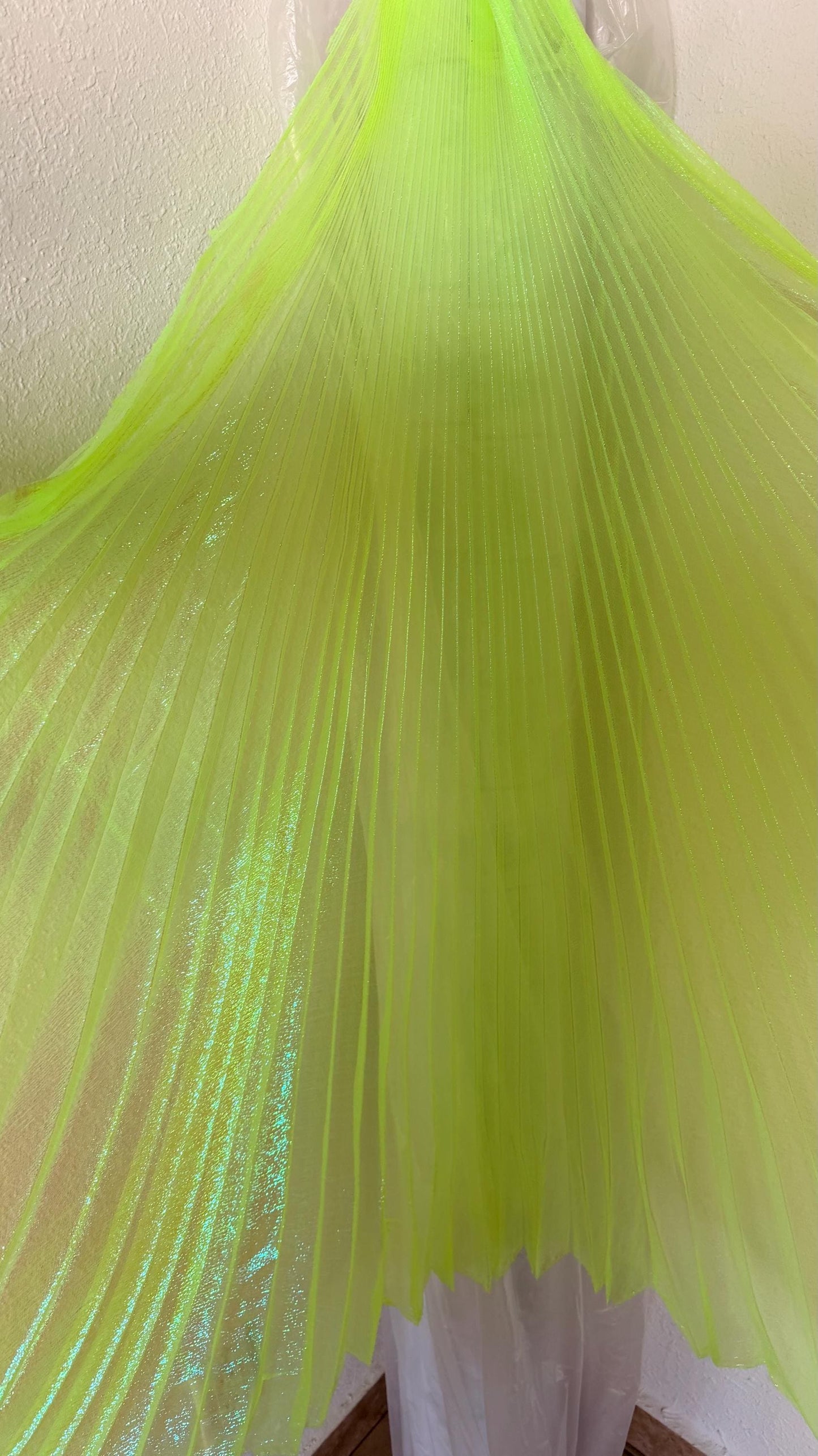 Sunburst pleated Iridescent metallic organza Wing Style 108” length by 56” width Sold by the PC ships worldwide from Los Angeles California