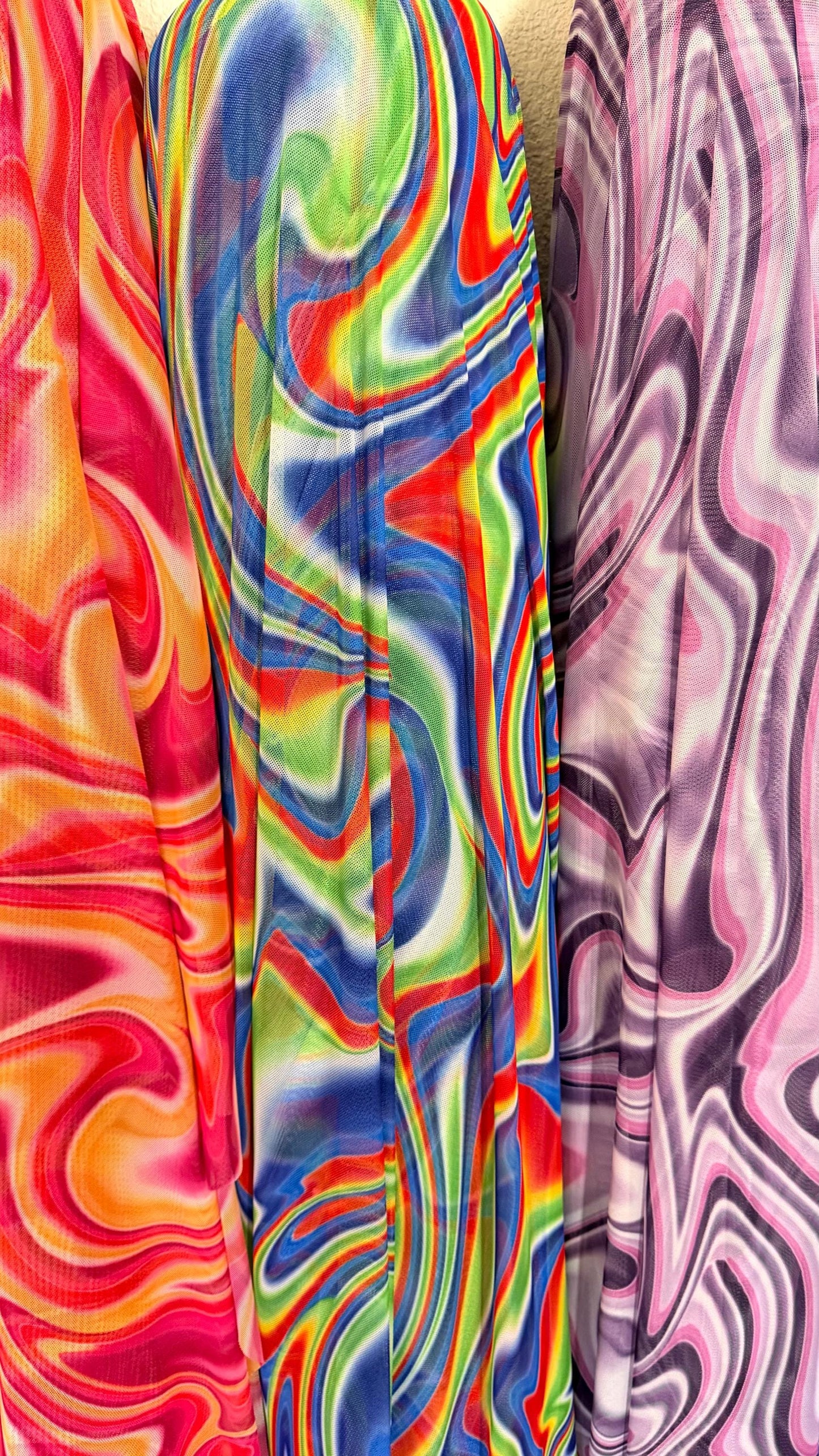 New Modern Swirl abstract lava design multicolor print on best quality of power mesh spandex 4-way stretch 58/60” Sold by the YD.