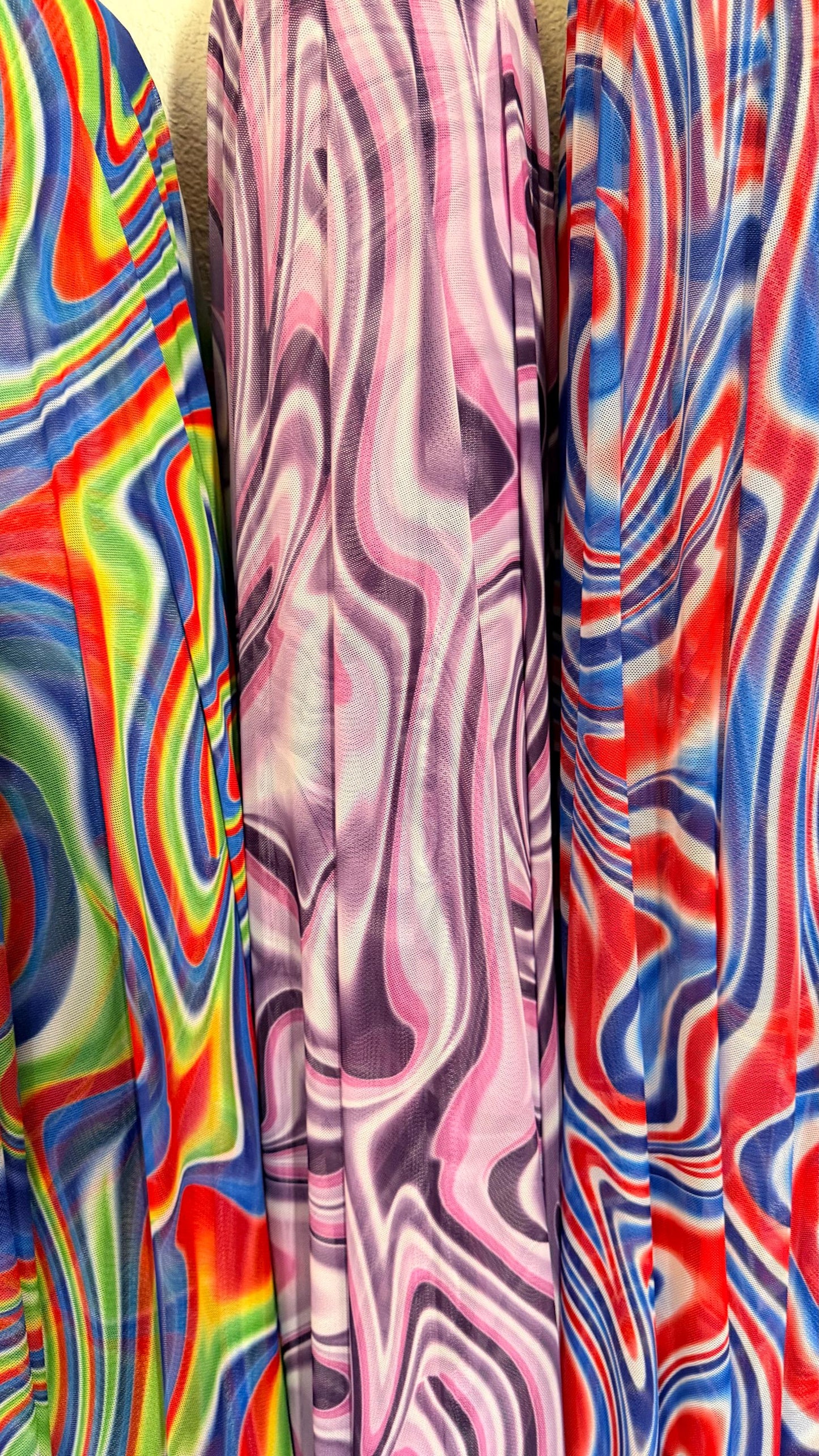 New Modern Swirl abstract lava design multicolor print on best quality of power mesh spandex 4-way stretch 58/60” Sold by the YD.