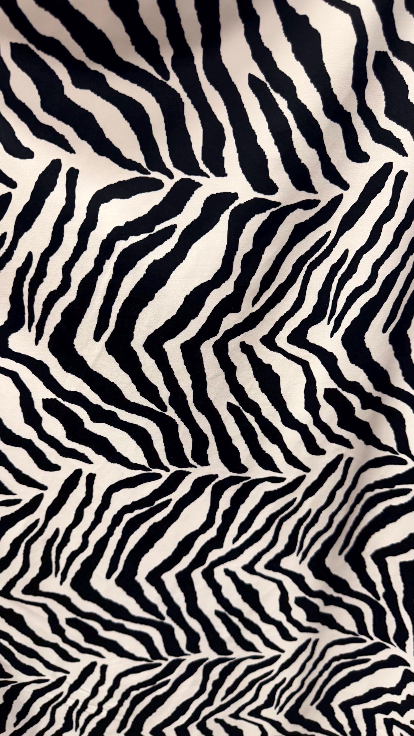 New Exotic zebra design medium size white/black & Taupe/Black print on best quality of nylon spandex 4-way stretch 58/60” Sold by the YD.
