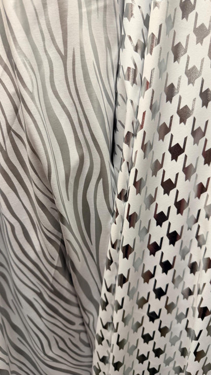 New Houndstooth & Zebra  design White/Silver metallic nylon spandex 4way stretch 58/60" Sold by the YD. Ships worldwide from Los Angeles CA