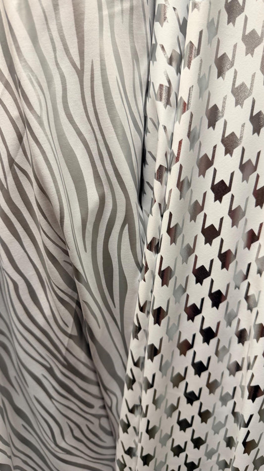 New Houndstooth & Zebra  design White/Silver metallic nylon spandex 4way stretch 58/60" Sold by the YD. Ships worldwide from Los Angeles CA