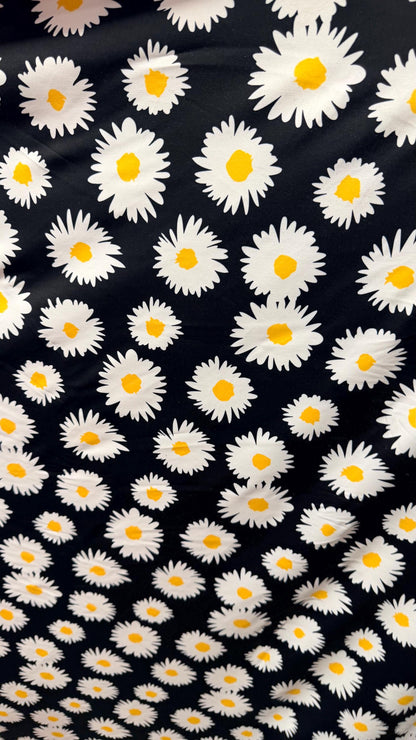 New Daisy flower design Black/white/yellow print on great quality of nylon spandex 4-way stretch 58/60” Sold by the YD.