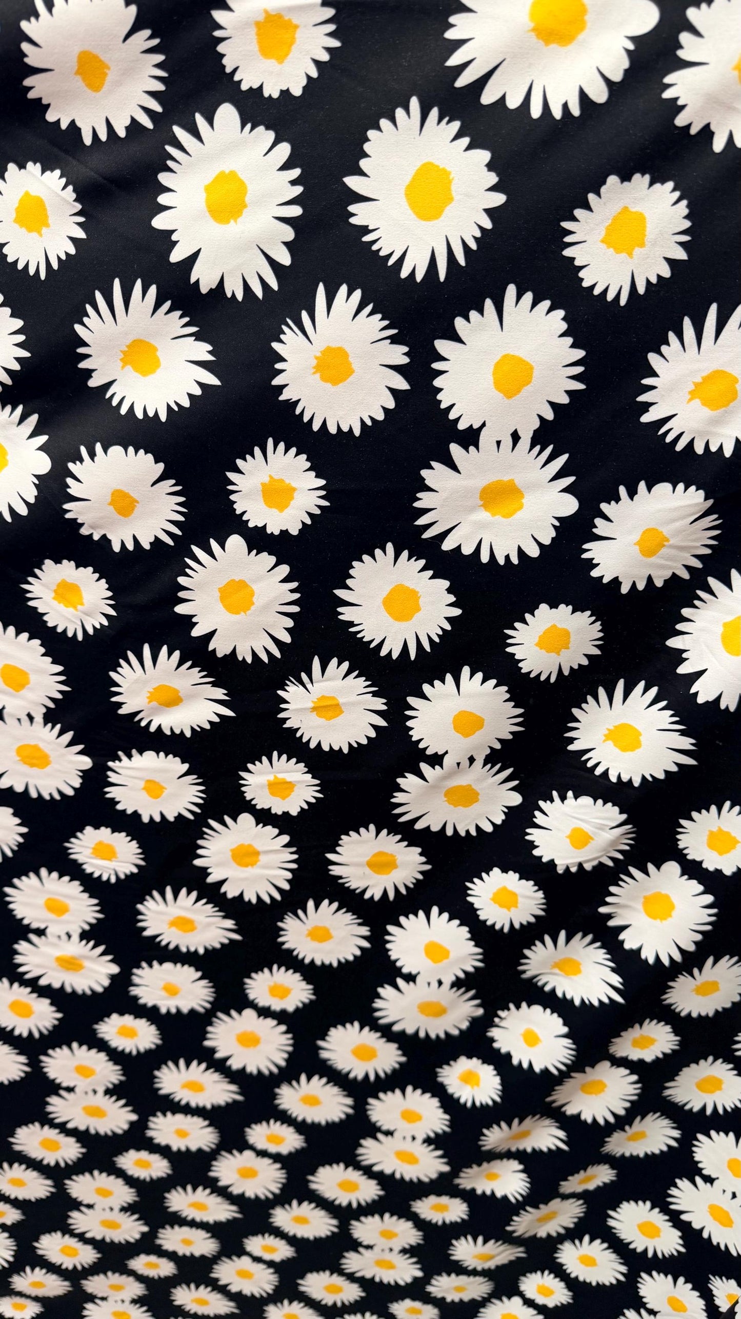 New Daisy flower design Black/white/yellow print on great quality of nylon spandex 4-way stretch 58/60” Sold by the YD.
