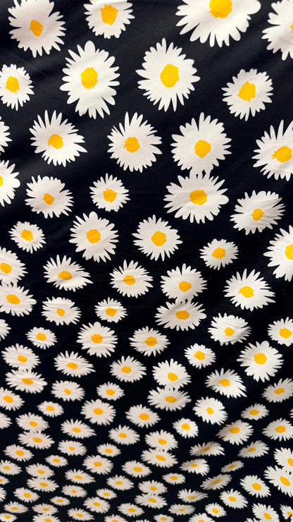 New Daisy flower design Black/white/yellow print on great quality of nylon spandex 4-way stretch 58/60” Sold by the YD.