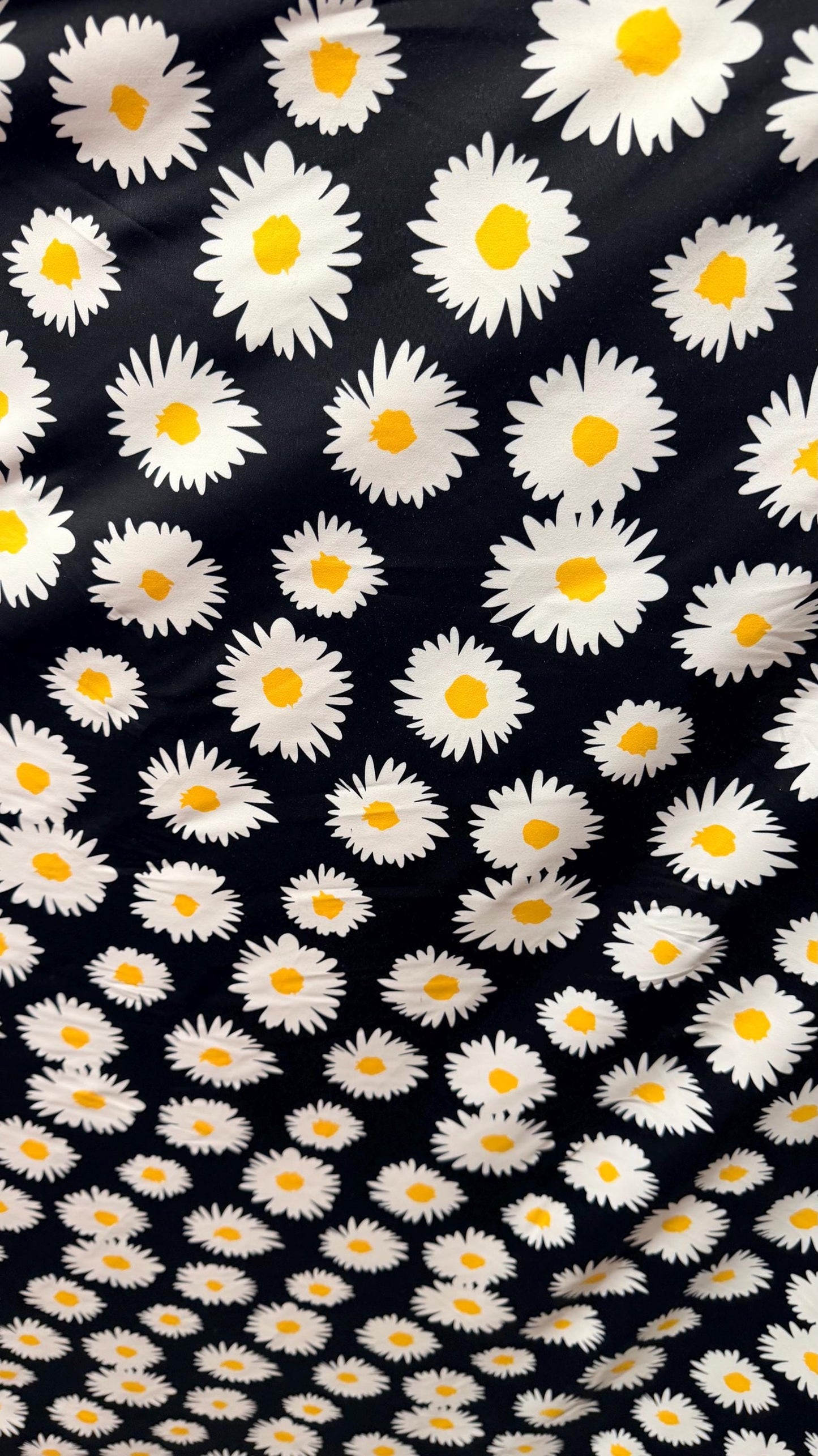 New Daisy flower design Black/white/yellow print on great quality of nylon spandex 4-way stretch 58/60” Sold by the YD.