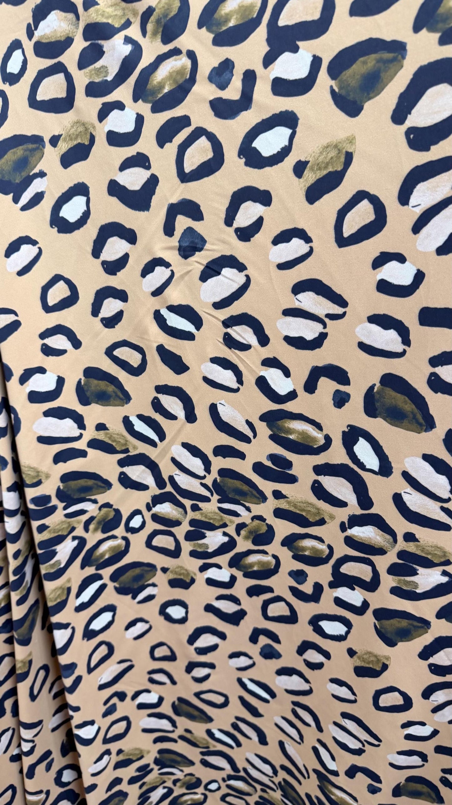New Leopard design Taupe/Multi  print on nylon spandex 4way stretch 58/60" Sold by the YD. Ships worldwide from Los Angeles California USA.