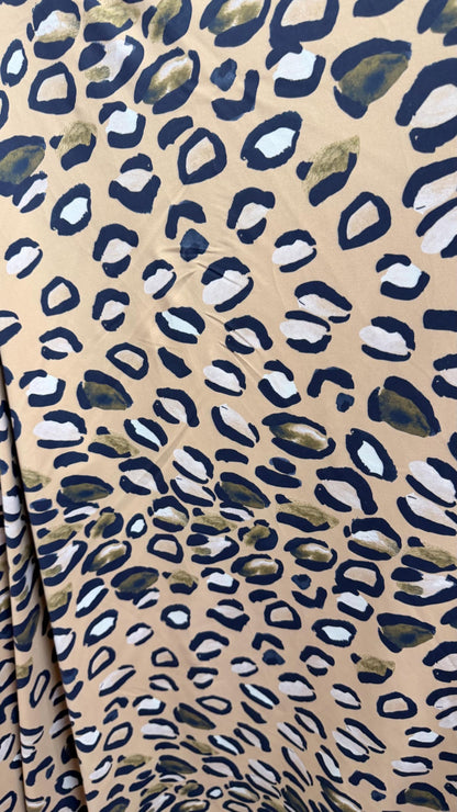 New Leopard design Taupe/Multi  print on nylon spandex 4way stretch 58/60" Sold by the YD. Ships worldwide from Los Angeles California USA.