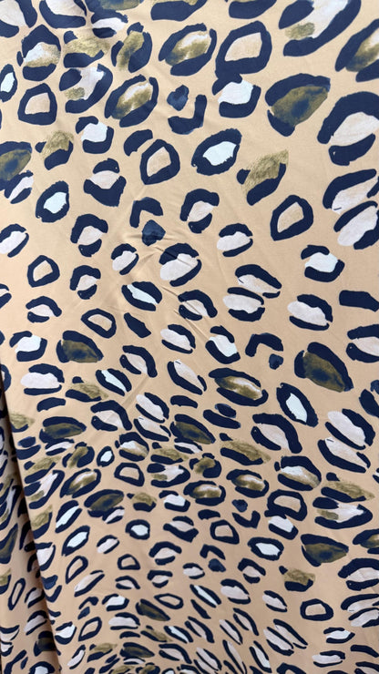 New Leopard design Taupe/Multi  print on nylon spandex 4way stretch 58/60" Sold by the YD. Ships worldwide from Los Angeles California USA.