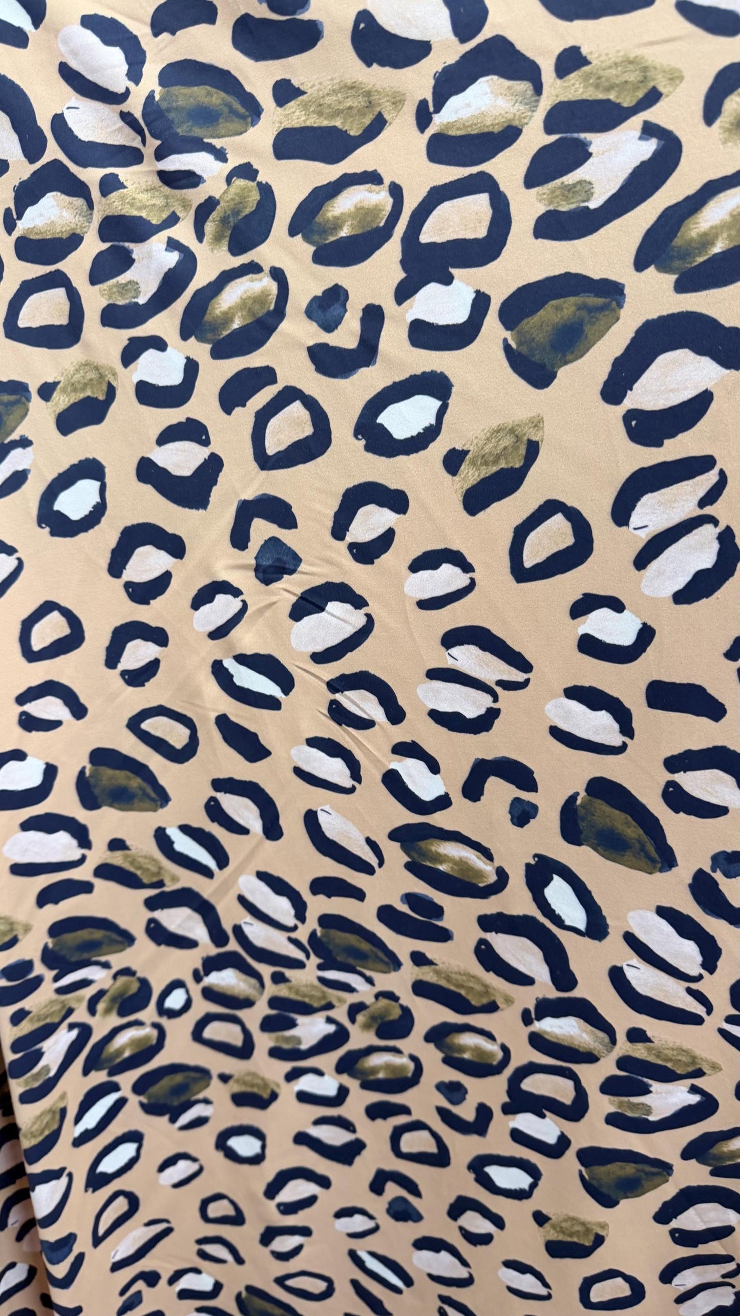 New Leopard design Taupe/Multi  print on nylon spandex 4way stretch 58/60" Sold by the YD. Ships worldwide from Los Angeles California USA.