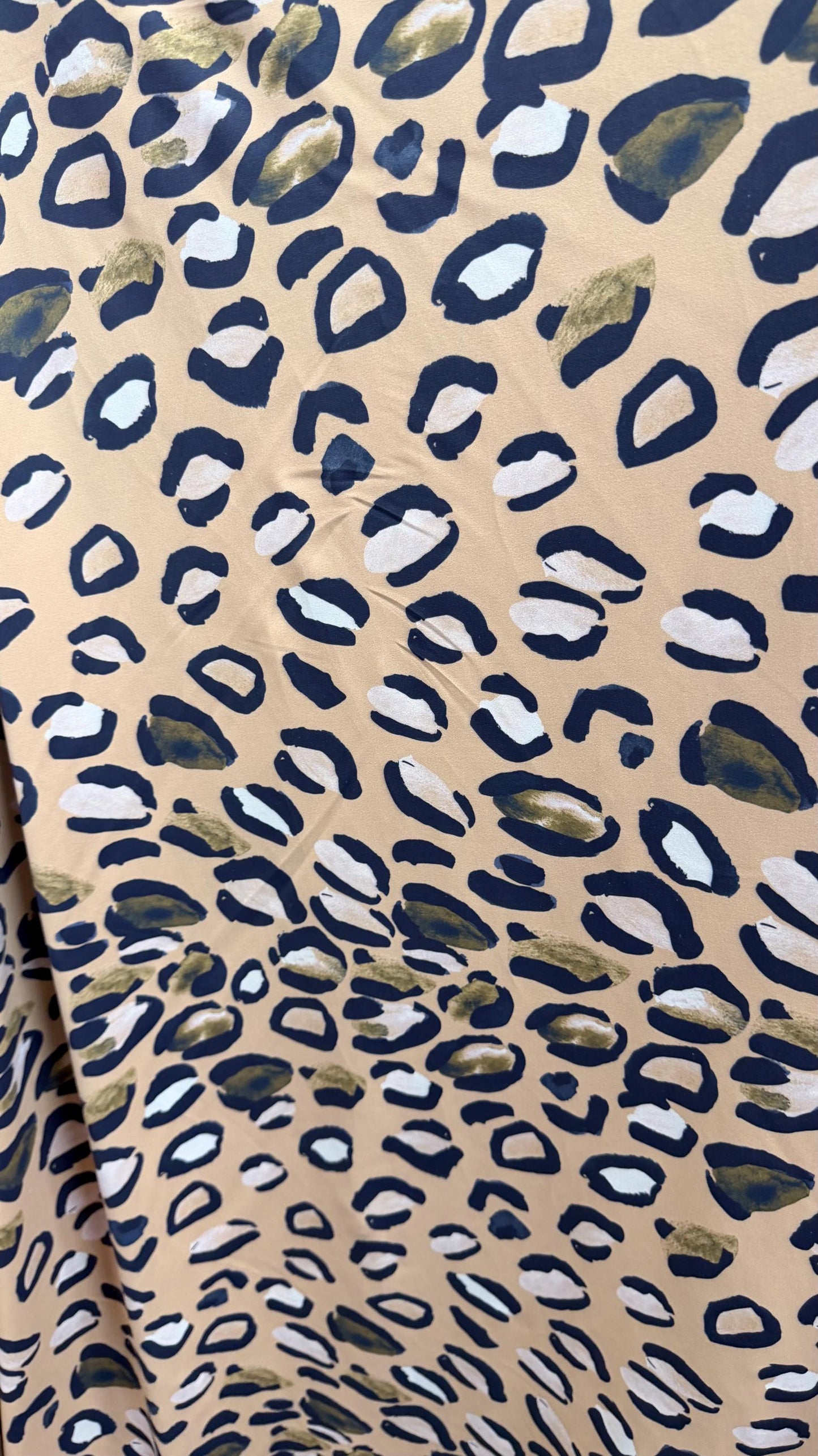 New Leopard design Taupe/Multi  print on nylon spandex 4way stretch 58/60" Sold by the YD. Ships worldwide from Los Angeles California USA.