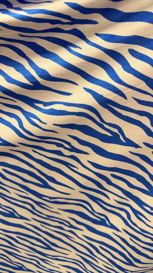 New Exotic Zebra design Taupe/Black print on nylon spandex 4way stretch 58/60" Sold by the YD. Ships worldwide from Los Angeles California