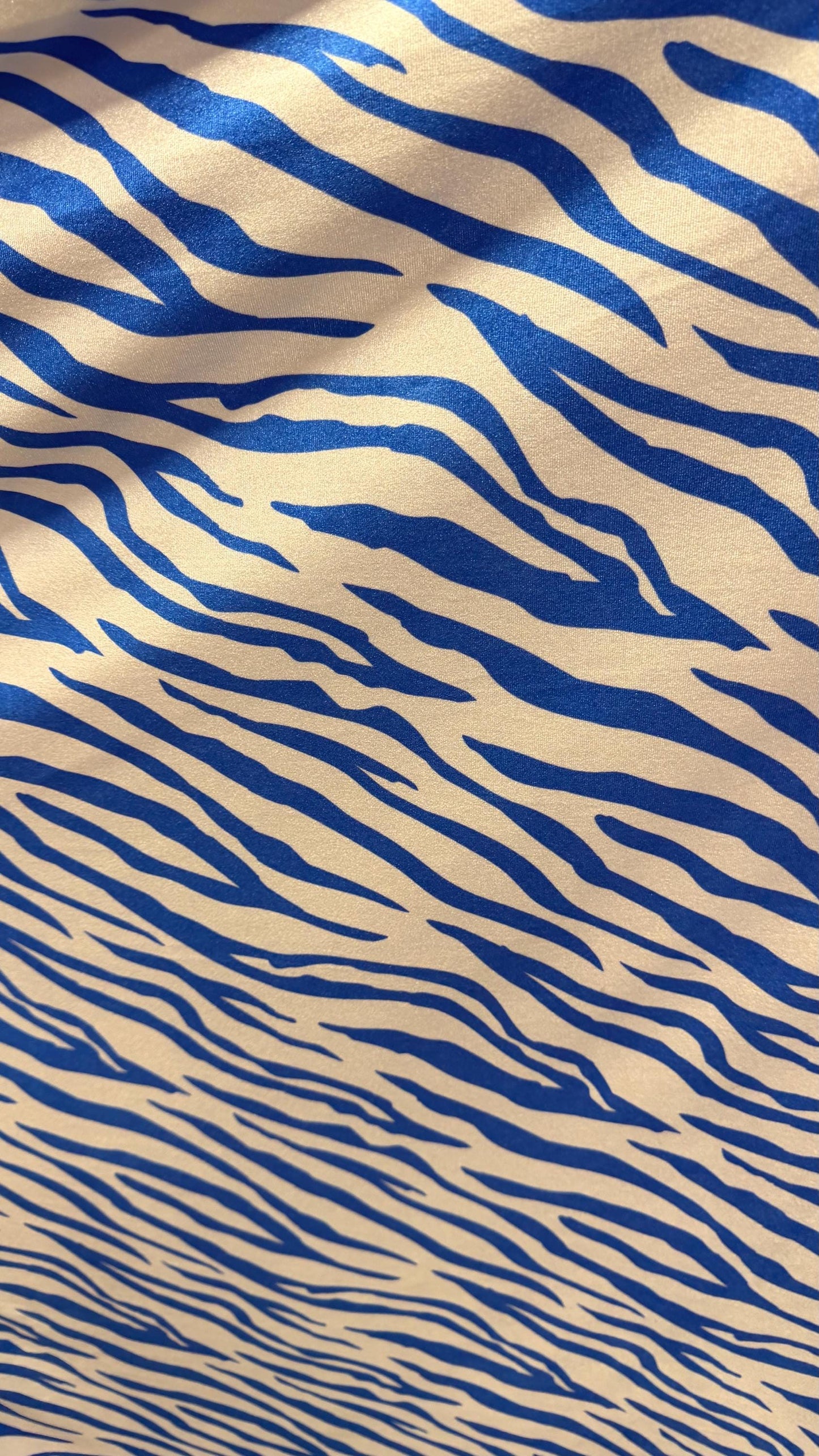New Exotic Zebra design Taupe/Black print on nylon spandex 4way stretch 58/60" Sold by the YD. Ships worldwide from Los Angeles California