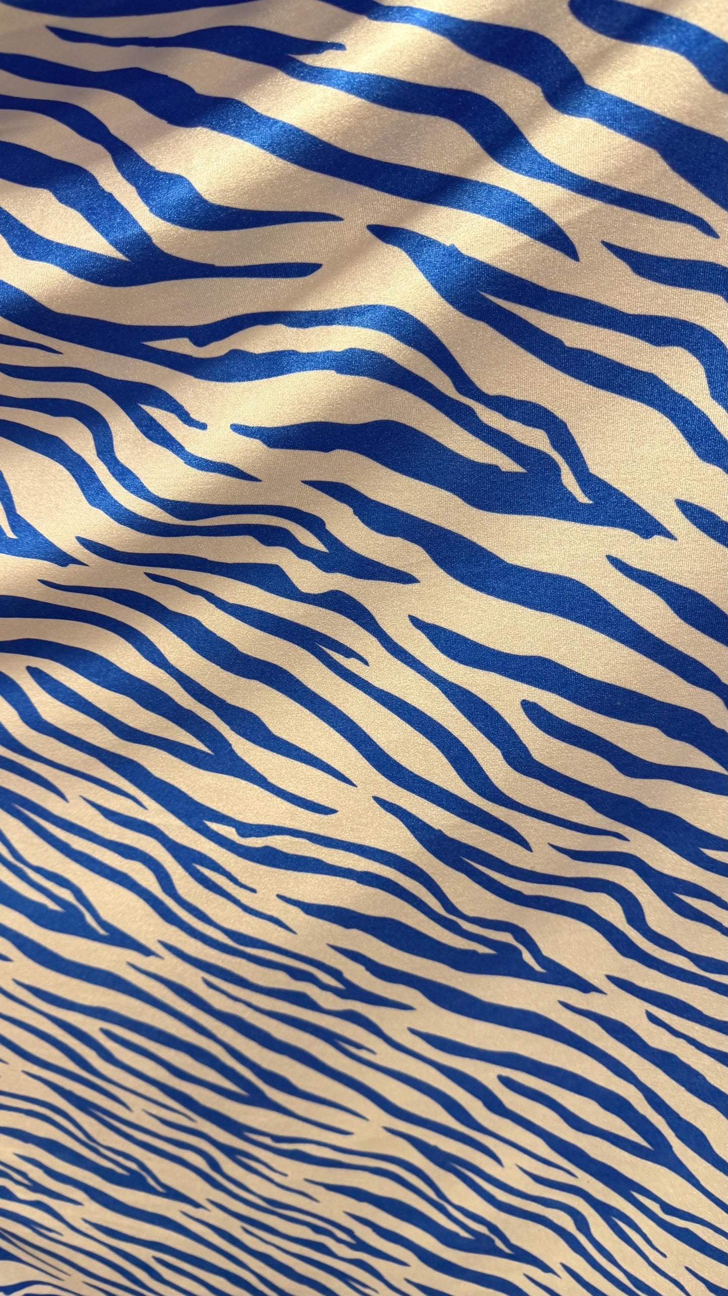 New Exotic Zebra design Taupe/Black print on nylon spandex 4way stretch 58/60" Sold by the YD. Ships worldwide from Los Angeles California