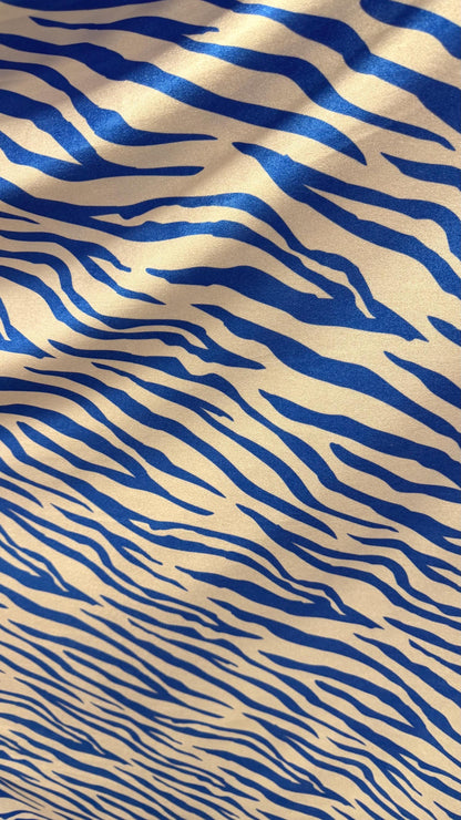 New Exotic Zebra design Taupe/Black print on nylon spandex 4way stretch 58/60" Sold by the YD. Ships worldwide from Los Angeles California