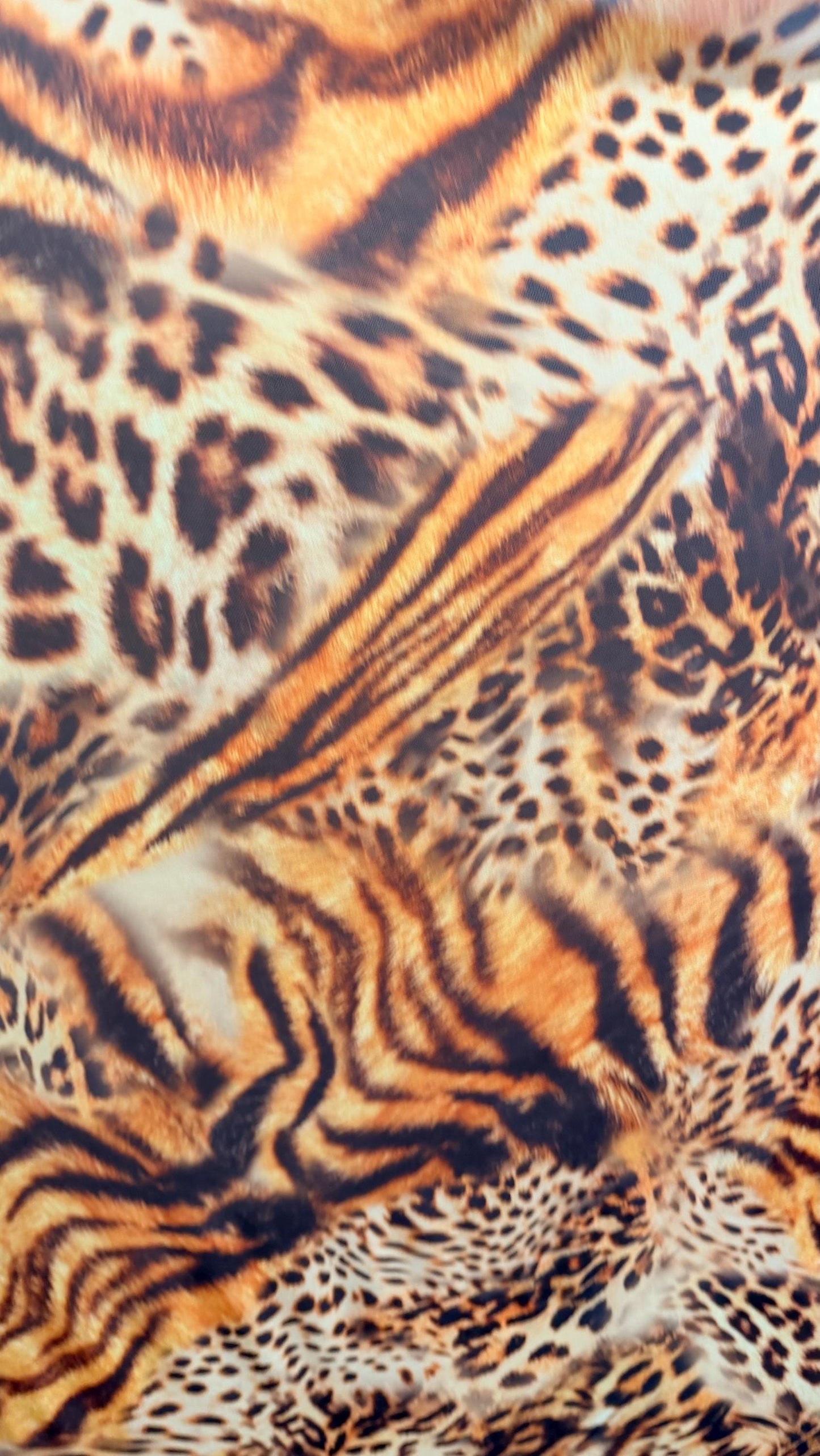 New Exotic Hiding Tiger design print on great quality of power mesh 4-way stretch 58/60” Sold by the YD. Ships Worldwide from Los Angeles CA