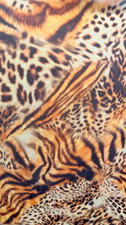 New Exotic Hiding Tiger design print on great quality of power mesh 4-way stretch 58/60” Sold by the YD. Ships Worldwide from Los Angeles CA