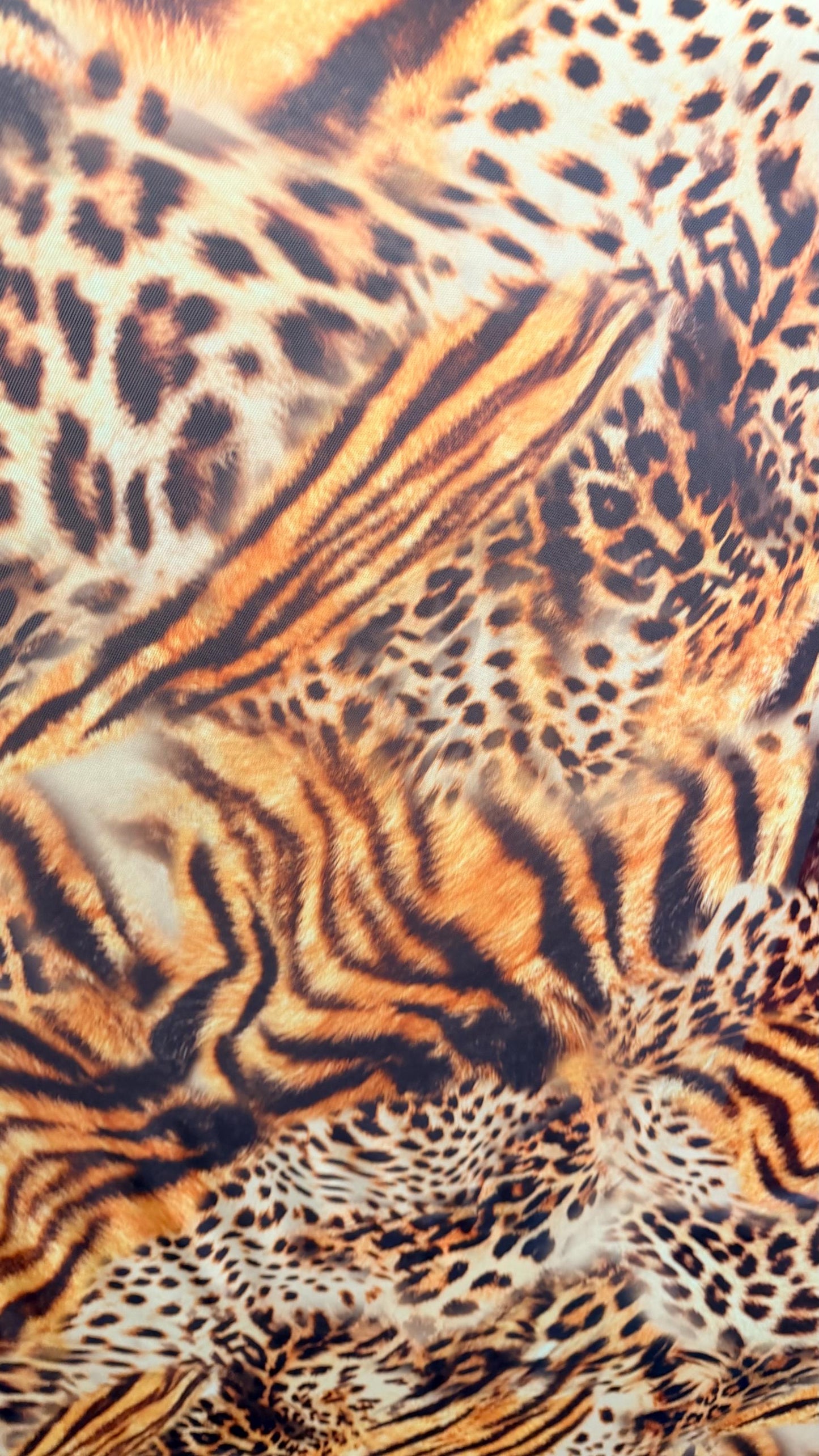 New Exotic Hiding Tiger design print on great quality of power mesh 4-way stretch 58/60” Sold by the YD. Ships Worldwide from Los Angeles CA