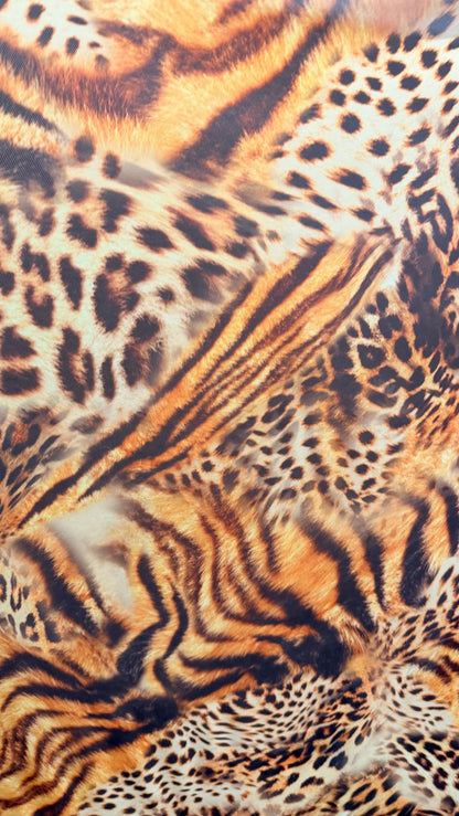 New Exotic Hiding Tiger design print on great quality of power mesh 4-way stretch 58/60” Sold by the YD. Ships Worldwide from Los Angeles CA