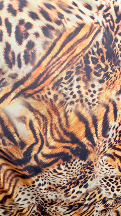 New Exotic Hiding Tiger design print on great quality of power mesh 4-way stretch 58/60” Sold by the YD. Ships Worldwide from Los Angeles CA