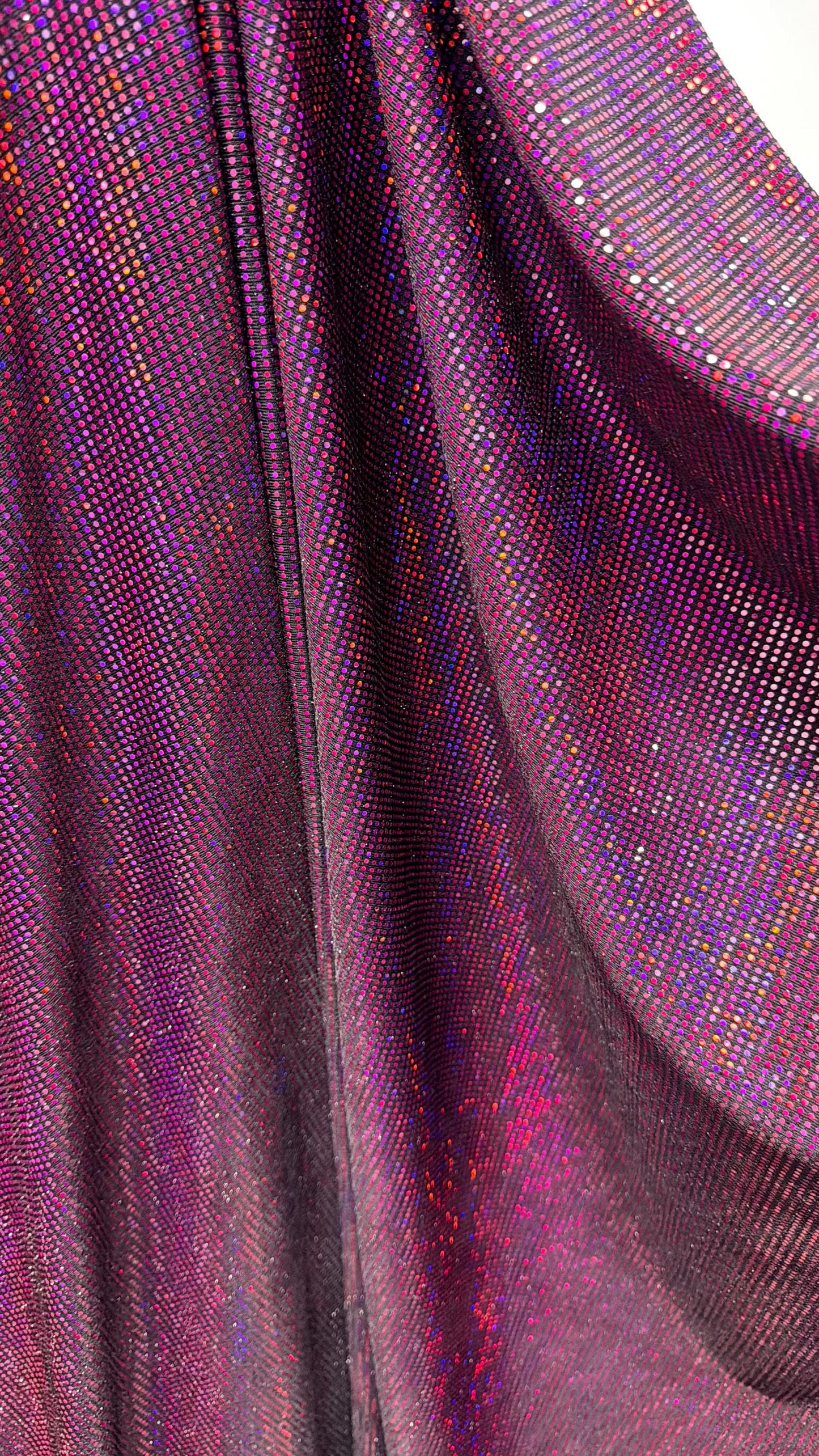 New Iridescent disco sequins design on metallic nylon spandex 2-way stretch 58/60” Sold by the YD. Ships Worldwide from Los Ángeles Californ