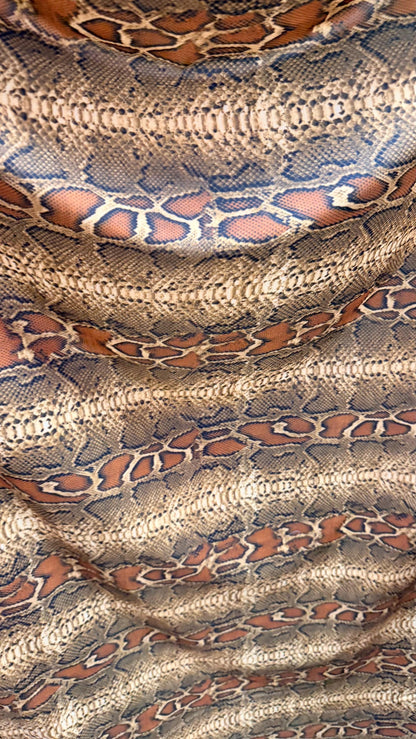 Cobra-Snake design New exotic animal print on great quality of nylon spandex 4-way stretch 58/60” Sold by the YD. Ships Worldwide from LA