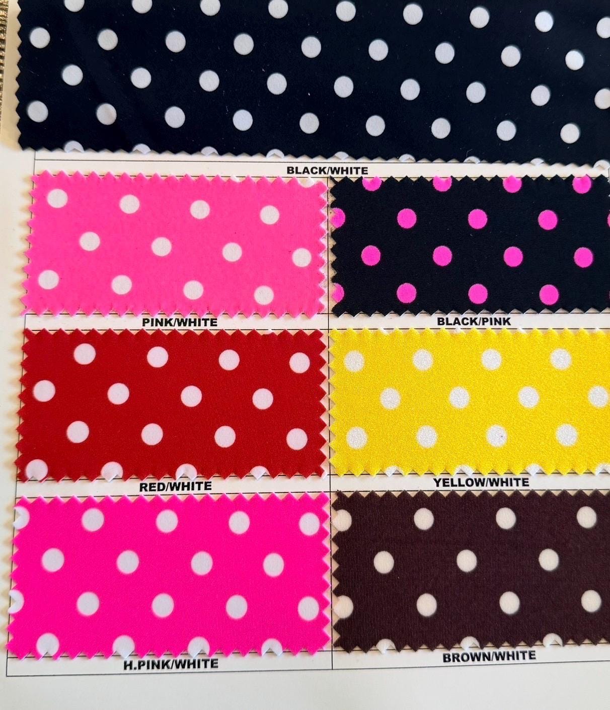 Polka dots design print on nylon spandex 4way stretch  58/60" sold by the Yd. Ships worldwide from Los Angeles California USA.