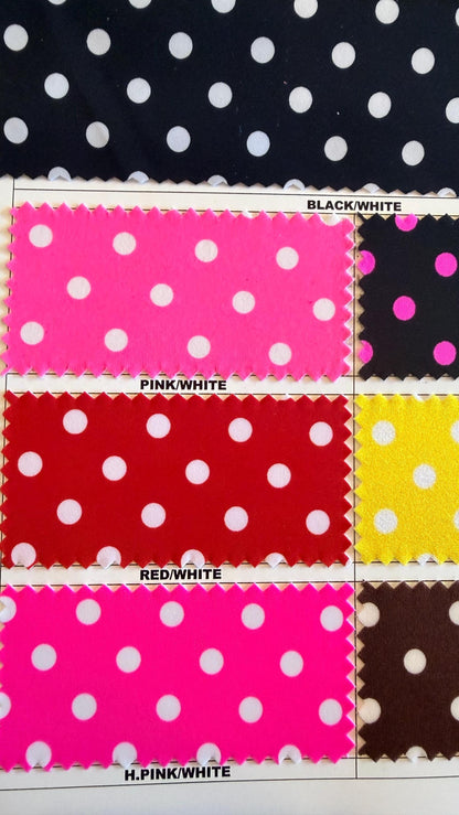Polka dots design print on nylon spandex 4way stretch  58/60" sold by the Yd. Ships worldwide from Los Angeles California USA.