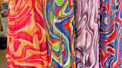 New Modern Swirl abstract lava design multicolor print on best quality of power mesh spandex 4-way stretch 58/60” Sold by the YD.