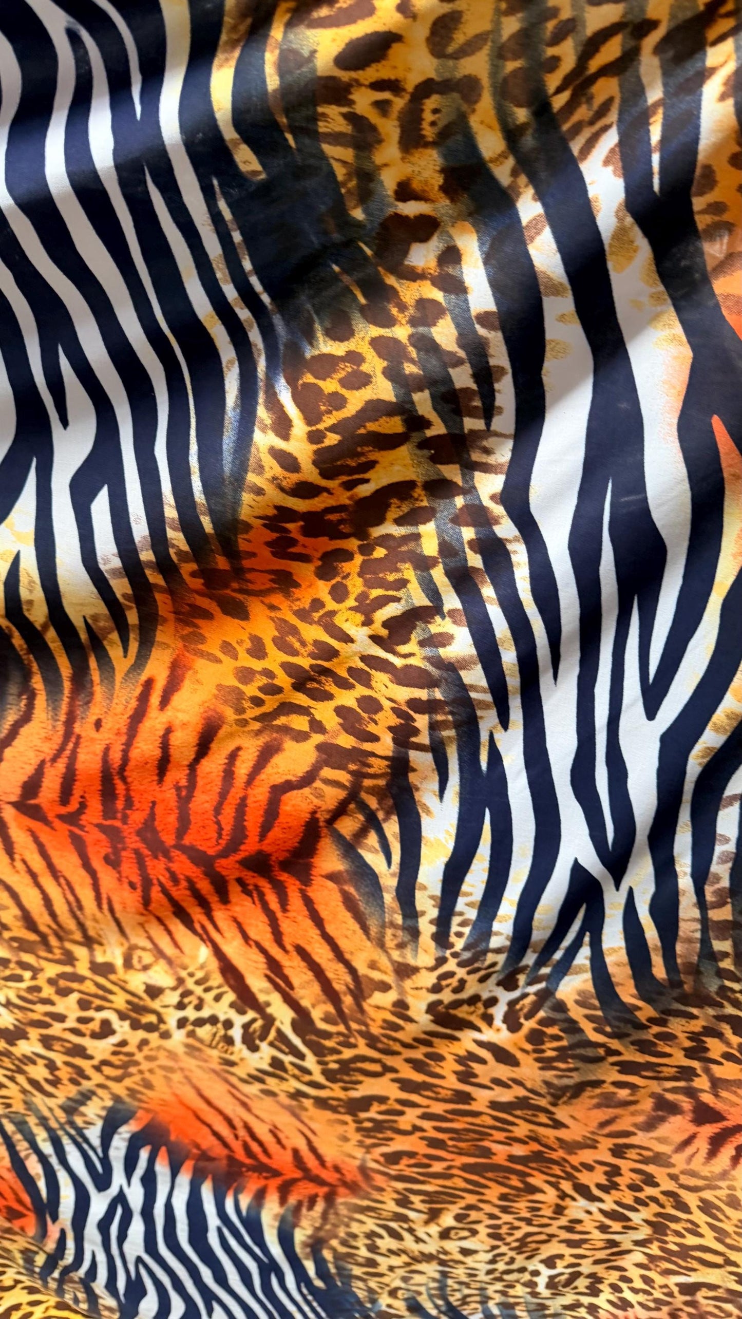 Safari design Exotic animal print spandex Light Weight 4-way stretch 58/60” Sold by the YD. Ships Worldwide from Los Angeles California USA.