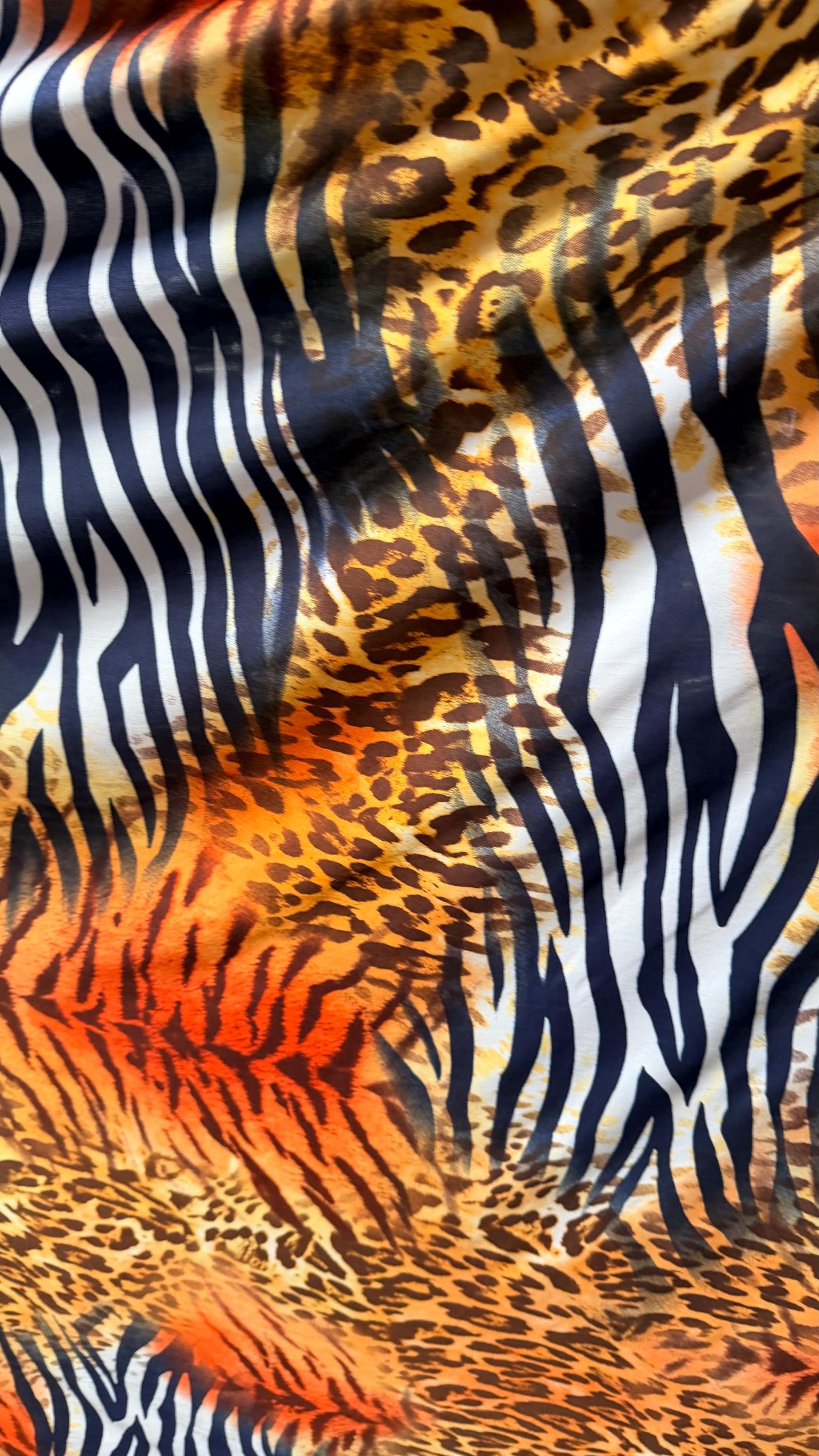 Safari design Exotic animal print spandex Light Weight 4-way stretch 58/60” Sold by the YD. Ships Worldwide from Los Angeles California USA.