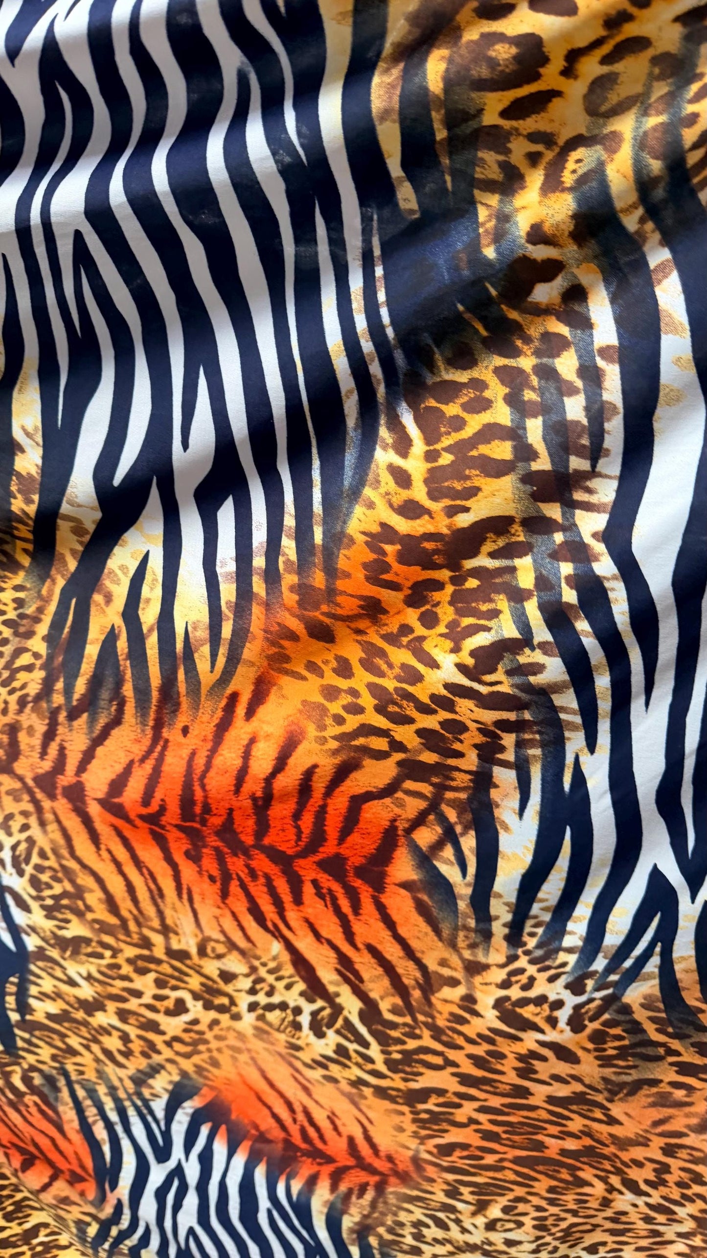 Safari design Exotic animal print spandex Light Weight 4-way stretch 58/60” Sold by the YD. Ships Worldwide from Los Angeles California USA.