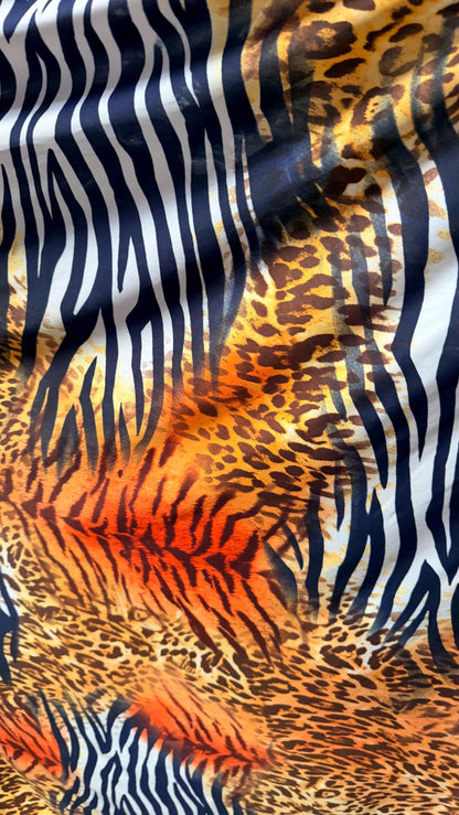 Safari design Exotic animal print spandex Light Weight 4-way stretch 58/60” Sold by the YD. Ships Worldwide from Los Angeles California USA.