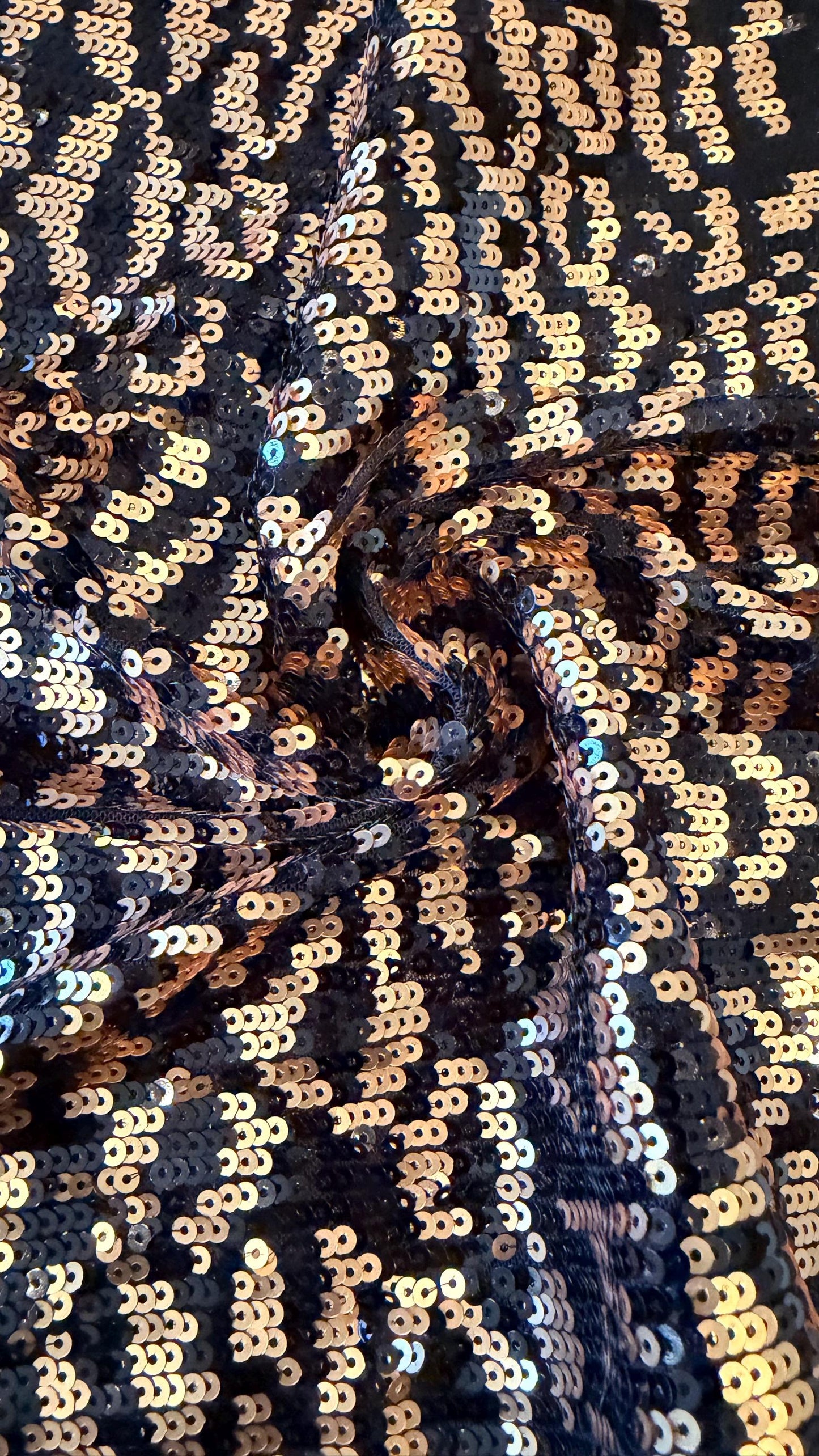 New Exotic leopard design Black/Gold on glitz cosmic sequins embroidered on powe mesh 2-way stretch 34/36” Sold by the YD.