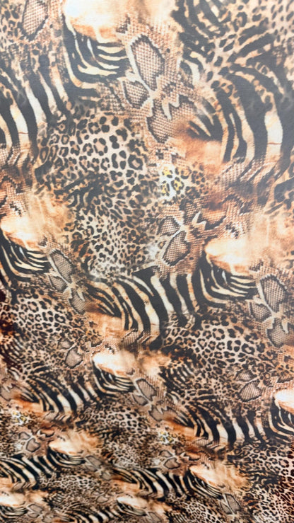 New Exotic Hiding Multi animal design print on great quality of power mesh nylon spandex 4way stretch 58/60” Sold by the YD. Ships Worldwide