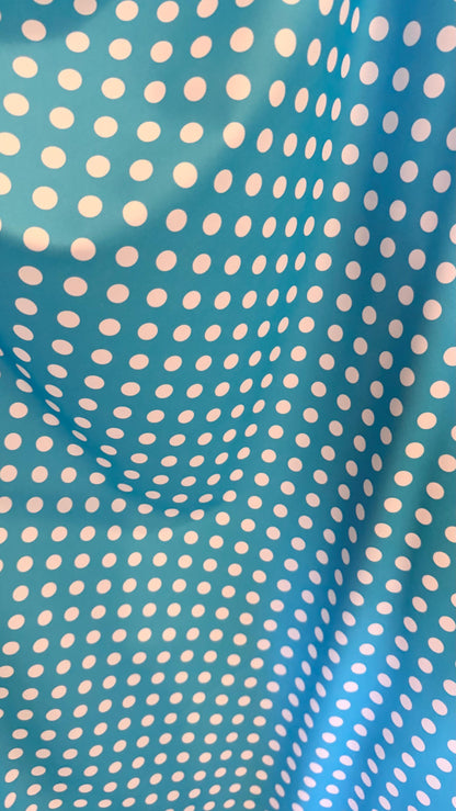 Polka dots design Aqua/White print on nylon spandex 4way stretch  58/60" sold by the Yd. Ships worldwide from Los Angeles California USA.