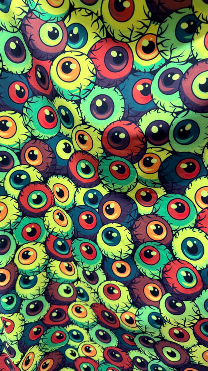 New Multicolor Abstrat Eyeballs design print on nylon  spandex 4-way stretch 58/60” Sold by the YD. Ships Worldwide from Los Angeles CA