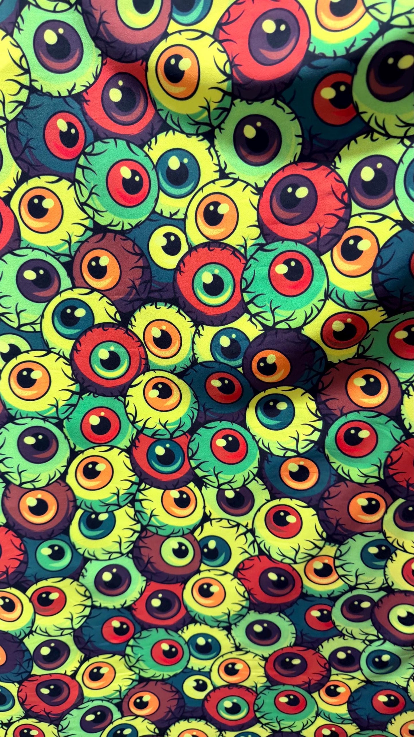 New Multicolor Abstrat Eyeballs design print on nylon  spandex 4-way stretch 58/60” Sold by the YD. Ships Worldwide from Los Angeles CA