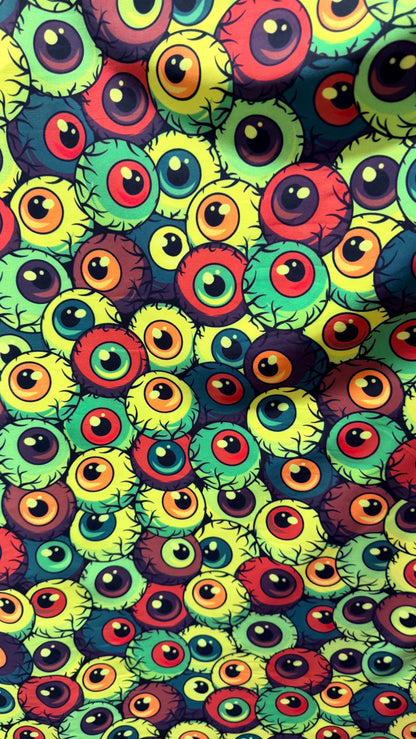 New Multicolor Abstrat Eyeballs design print on nylon  spandex 4-way stretch 58/60” Sold by the YD. Ships Worldwide from Los Angeles CA