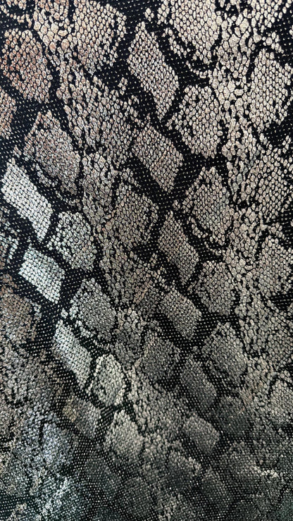 New metallic snake skin design on nylon  spandex base 4 way stretch 58/60" Sold by the YD. ships worldwide from Los Angeles California USA