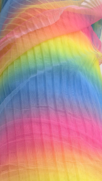 New Rainbow design print on pleated poly stretch mesh 2 way stretch 58/60" Sold by the YD. Ships worldwide from Los Angeles California USA.