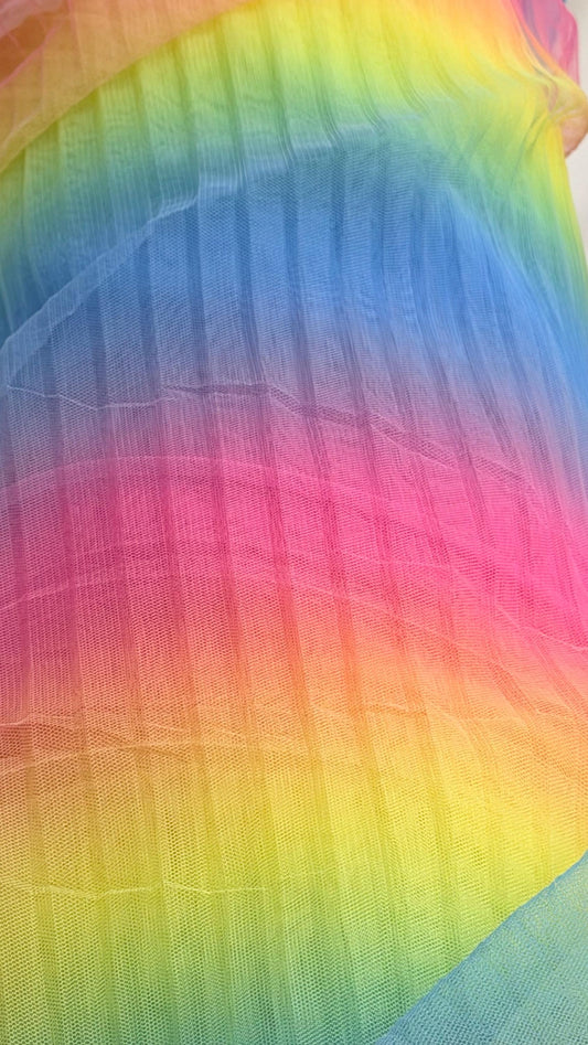 New Rainbow design print on pleated poly stretch mesh 2 way stretch 58/60" Sold by the YD. Ships worldwide from Los Angeles California USA.