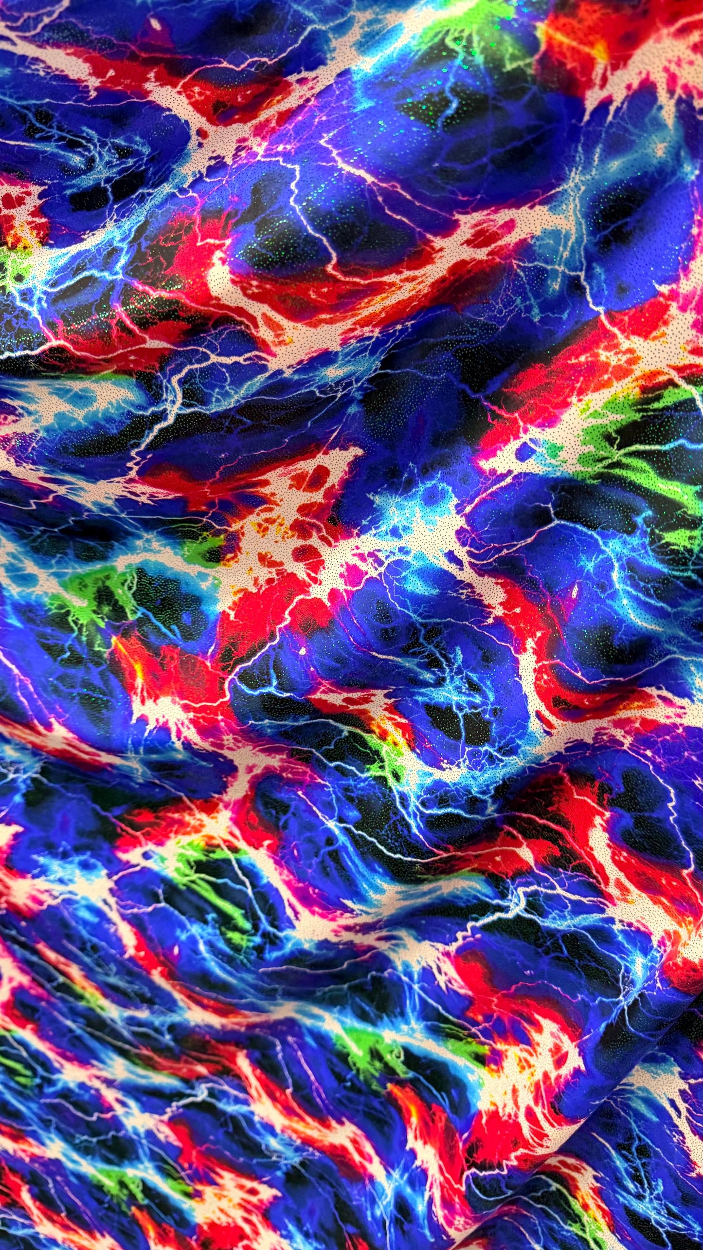 Thunderstorm design print on great quality of nylon spandex with hologram foggy foil  4-way stretch 58/60” Sold by the YD. Ships worldwide