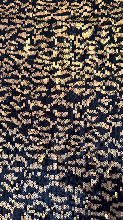 New Exotic leopard design Black/Gold on glitz cosmic sequins embroidered on powe mesh 2-way stretch 34/36” Sold by the YD.