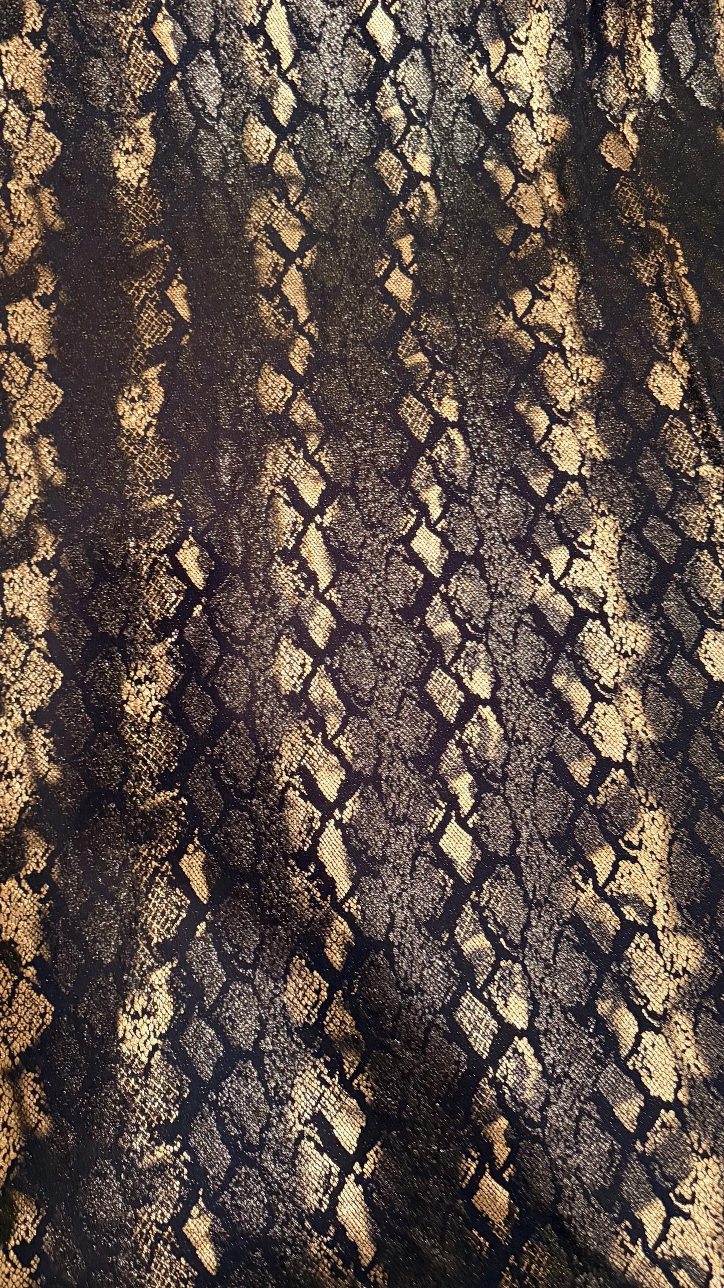 New Luxury snake design black/gold metallic nylon spandex with foil  4 way stretch 58/60” Sold by the YD. Ships worldwide from Los Angeles