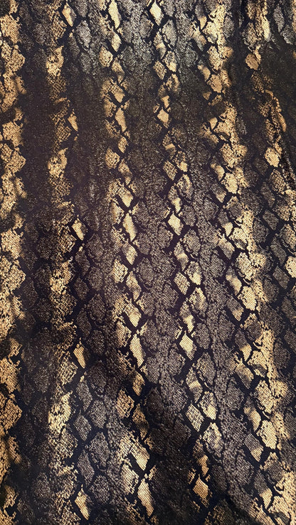 New Luxury snake design black/gold metallic nylon spandex with foil  4 way stretch 58/60” Sold by the YD. Ships worldwide from Los Angeles