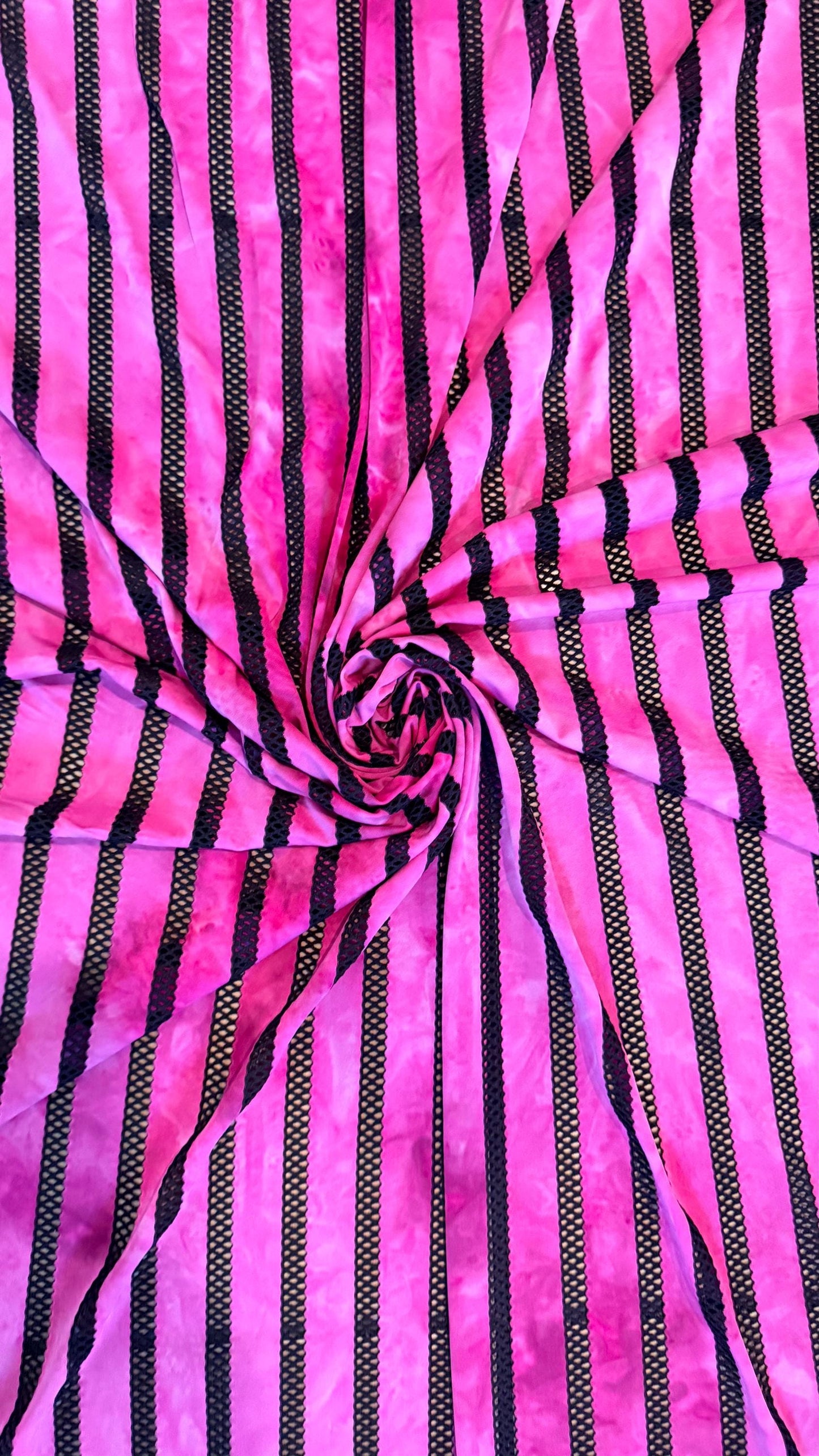 New stripe tie dye  nylon spandex mesh pink color  4-way stretch 58/60” Sold by the YD. Ships worldwide from Los Angeles California USA.