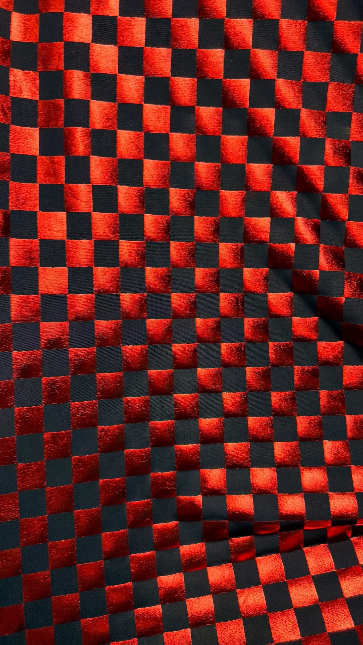 Checkered design metallic poly spandex Red/Black 2-way stretch 58/60” Sold by the YD. Ships Worldwide from Los Angeles California USA