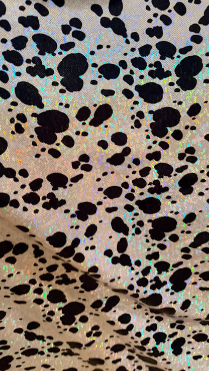 Dalmatian Exotic design w/silver/Black on shattered glass hologram metallic nylon spandex 4-way stretch 58/60” Sold by the YD. High quality